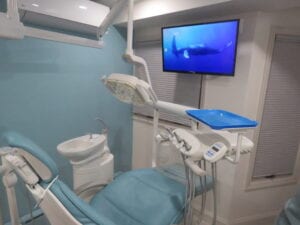 Monitor and lights above the dental chair